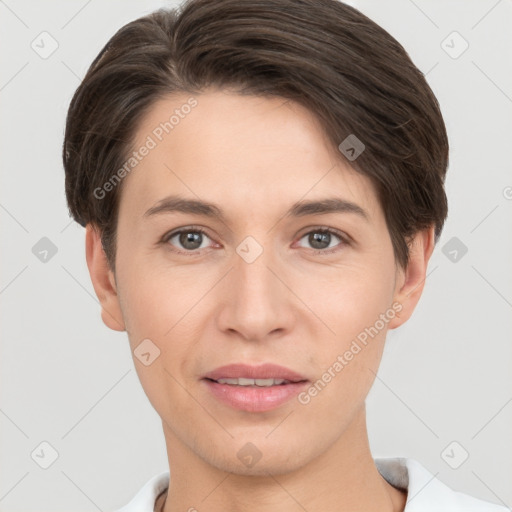 Joyful white young-adult female with short  brown hair and brown eyes