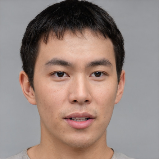 Neutral asian young-adult male with short  brown hair and brown eyes