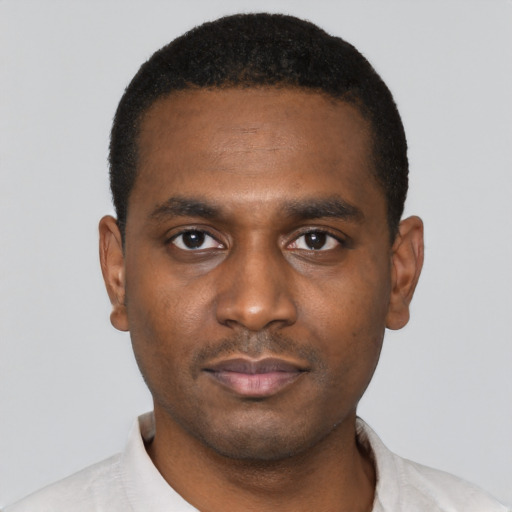 Neutral black young-adult male with short  black hair and brown eyes