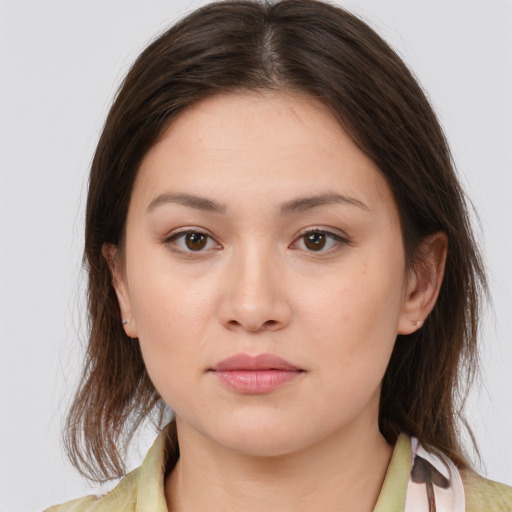 Neutral white young-adult female with medium  brown hair and brown eyes