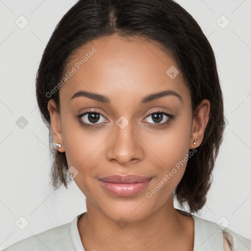 Joyful latino young-adult female with medium  brown hair and brown eyes