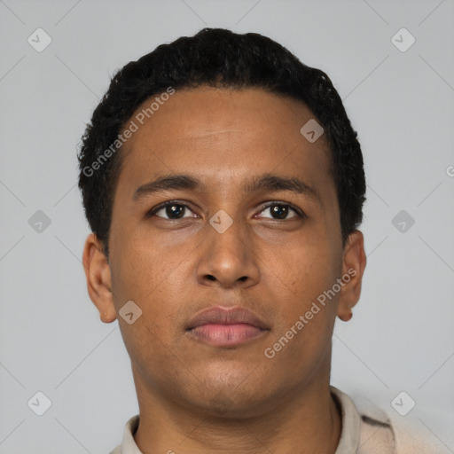 Neutral latino young-adult male with short  black hair and brown eyes