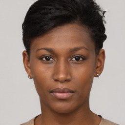 Neutral black young-adult female with short  brown hair and brown eyes