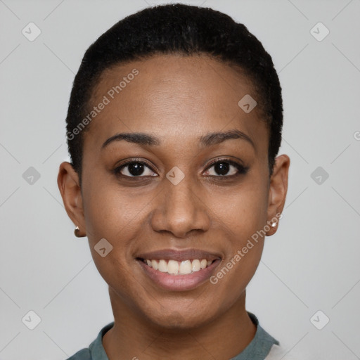 Joyful black young-adult female with short  black hair and brown eyes