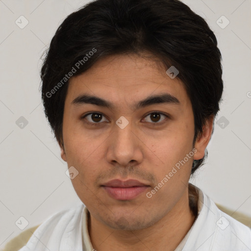 Joyful latino young-adult male with short  brown hair and brown eyes