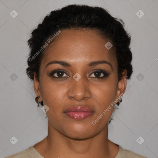 Joyful black young-adult female with short  brown hair and brown eyes