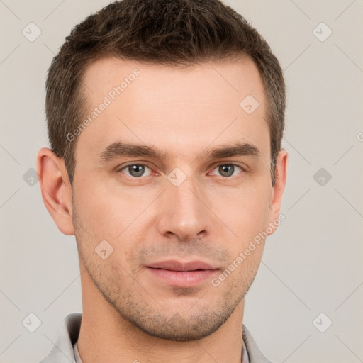 Neutral white young-adult male with short  brown hair and grey eyes