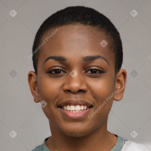 Joyful black young-adult female with short  brown hair and brown eyes