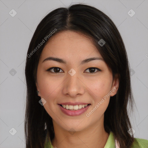 Joyful asian young-adult female with long  brown hair and brown eyes