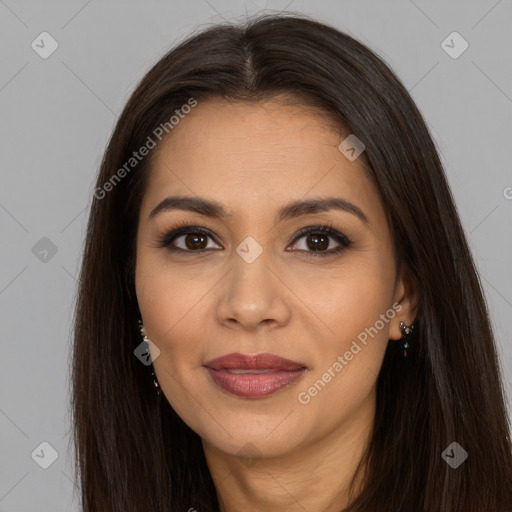 Joyful latino young-adult female with long  brown hair and brown eyes