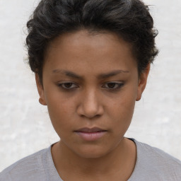 Neutral white young-adult female with short  brown hair and brown eyes