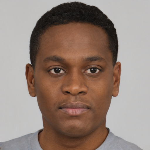 Neutral black young-adult male with short  brown hair and brown eyes