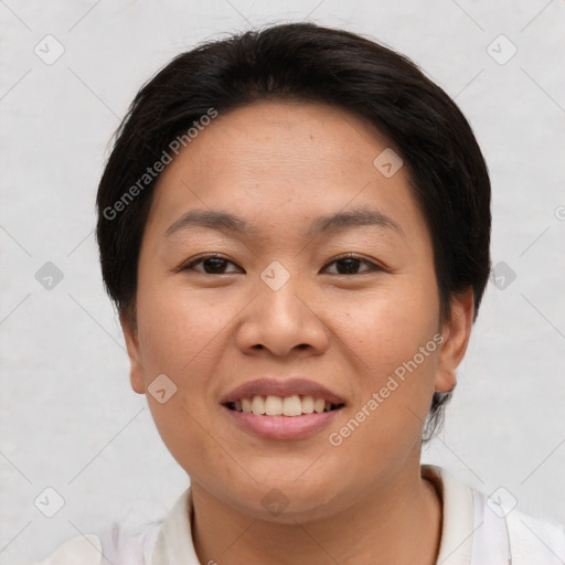 Joyful asian young-adult female with short  brown hair and brown eyes