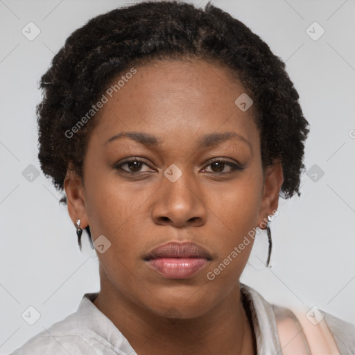 Neutral black young-adult female with short  brown hair and brown eyes