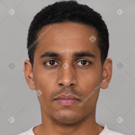 Neutral latino young-adult male with short  black hair and brown eyes