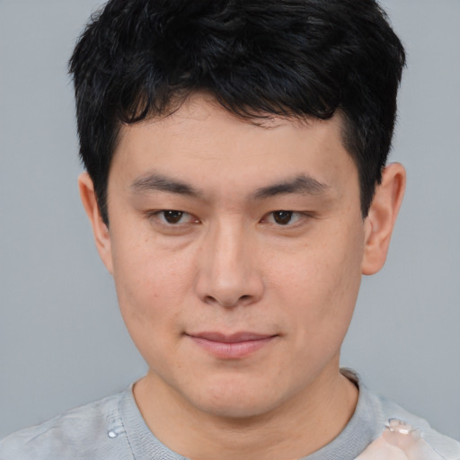 Neutral asian young-adult male with short  brown hair and brown eyes