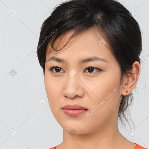 Neutral asian young-adult female with medium  brown hair and brown eyes