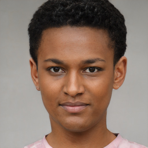 Joyful black young-adult male with short  brown hair and brown eyes