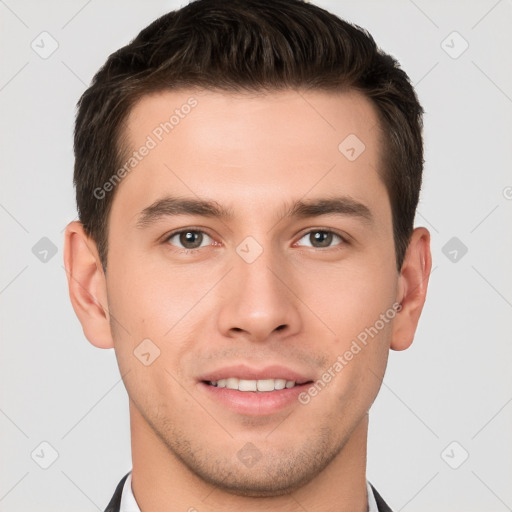 Joyful white young-adult male with short  brown hair and brown eyes