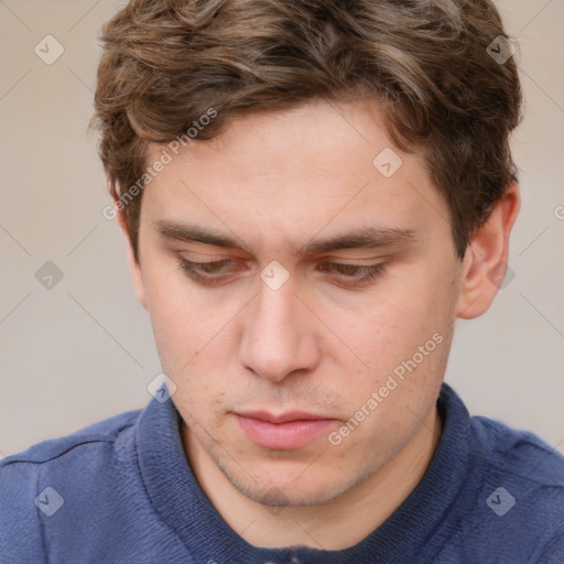 Neutral white young-adult male with short  brown hair and grey eyes