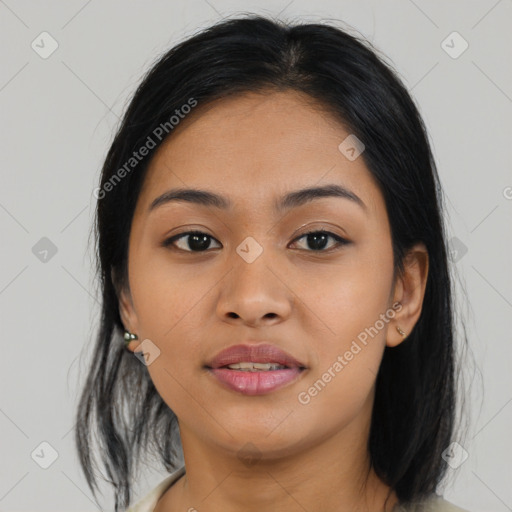 Joyful asian young-adult female with medium  black hair and brown eyes