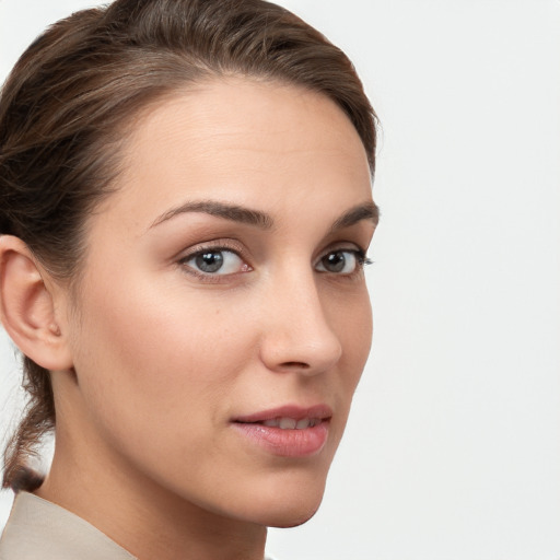 Neutral white young-adult female with short  brown hair and brown eyes