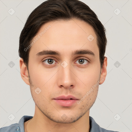 Neutral white young-adult male with short  brown hair and brown eyes