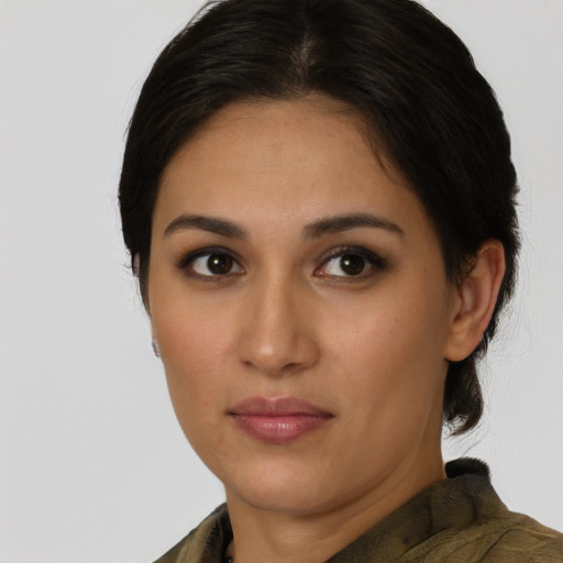Neutral latino young-adult female with short  brown hair and brown eyes