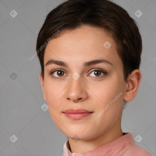 Joyful white young-adult female with short  brown hair and brown eyes