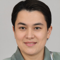 Joyful asian young-adult male with short  brown hair and brown eyes