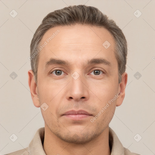 Neutral white adult male with short  brown hair and brown eyes