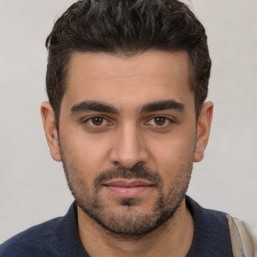 Neutral white young-adult male with short  black hair and brown eyes