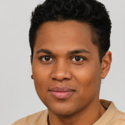 Joyful latino young-adult male with short  brown hair and brown eyes