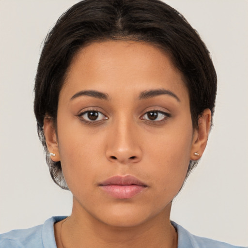 Neutral latino young-adult female with short  brown hair and brown eyes