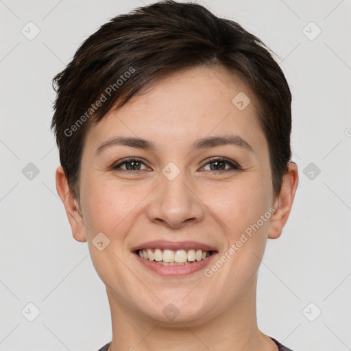 Joyful white young-adult female with short  brown hair and brown eyes