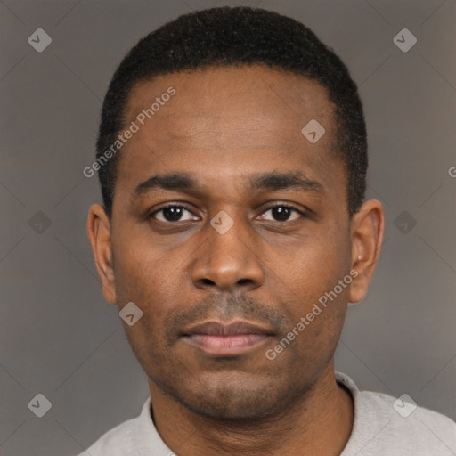 Neutral black young-adult male with short  black hair and brown eyes