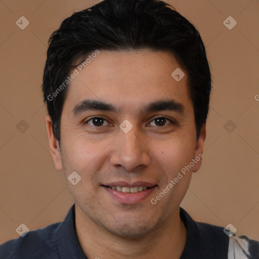 Joyful white young-adult male with short  black hair and brown eyes