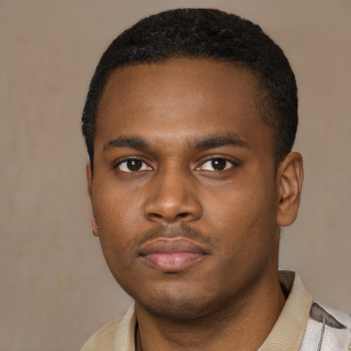 Neutral latino young-adult male with short  brown hair and brown eyes