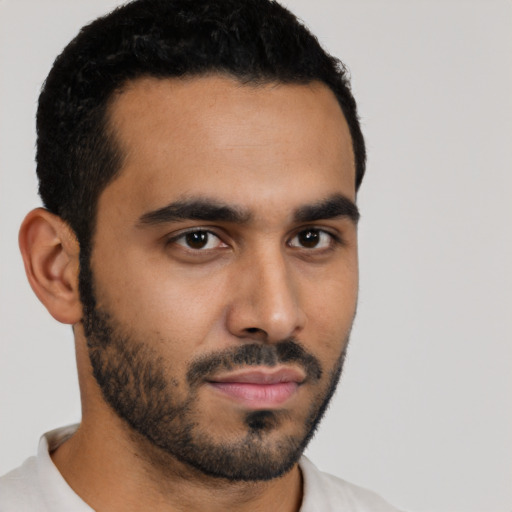 Neutral latino young-adult male with short  black hair and brown eyes