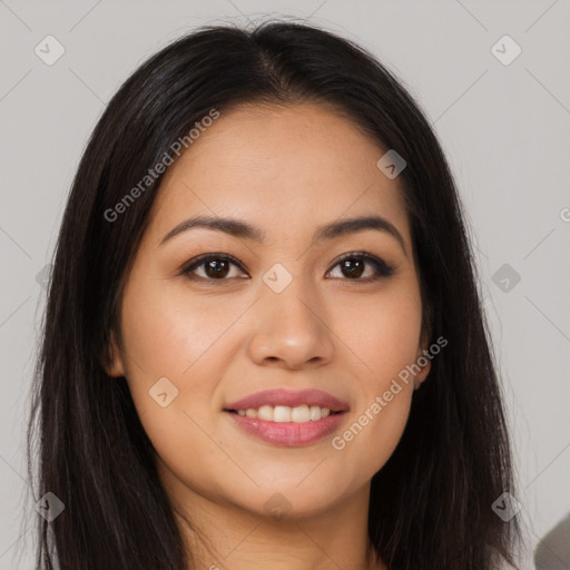 Joyful asian young-adult female with long  brown hair and brown eyes