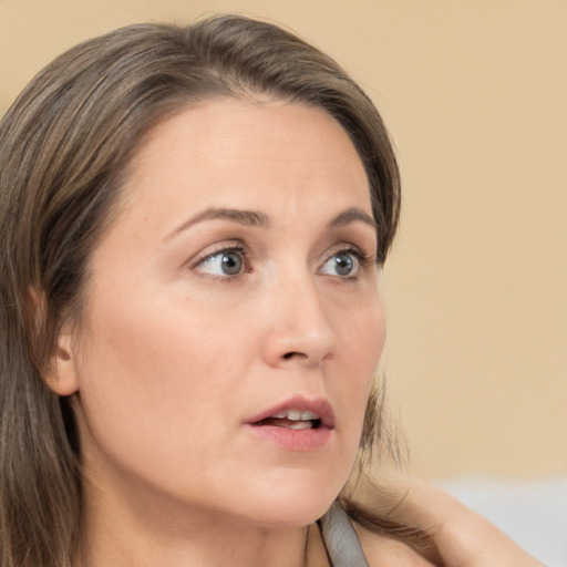 Neutral white adult female with medium  brown hair and brown eyes