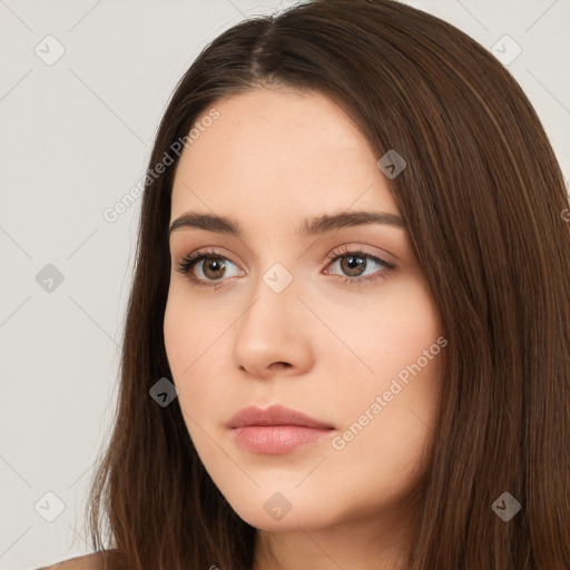 Neutral white young-adult female with long  brown hair and brown eyes