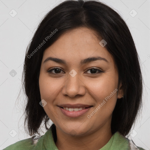 Joyful latino young-adult female with long  brown hair and brown eyes