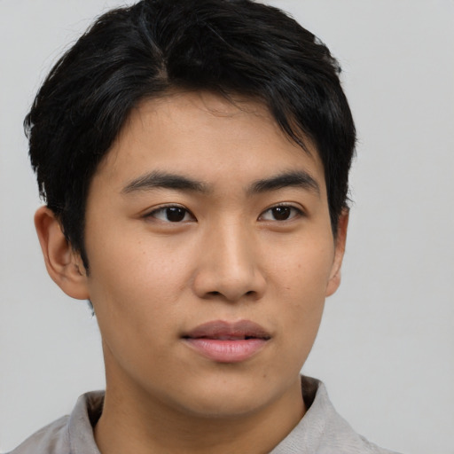 Neutral asian young-adult male with short  brown hair and brown eyes