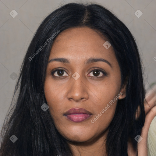 Joyful asian young-adult female with long  black hair and brown eyes