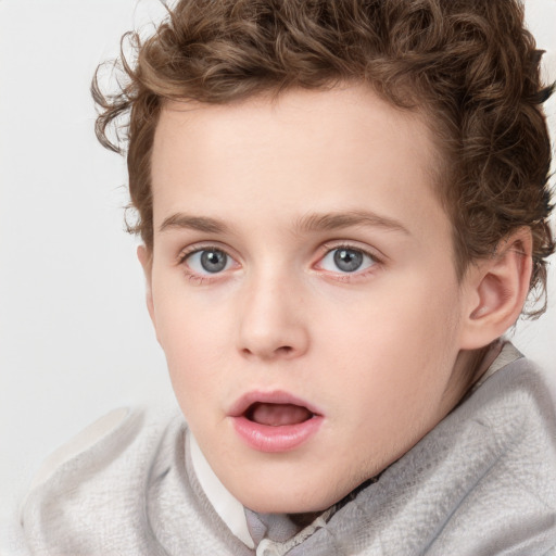 Neutral white child male with short  brown hair and blue eyes