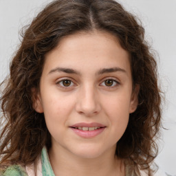 Joyful white young-adult female with medium  brown hair and green eyes