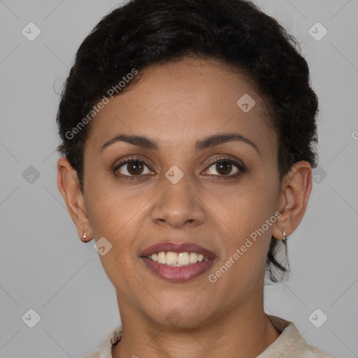 Joyful latino young-adult female with short  brown hair and brown eyes