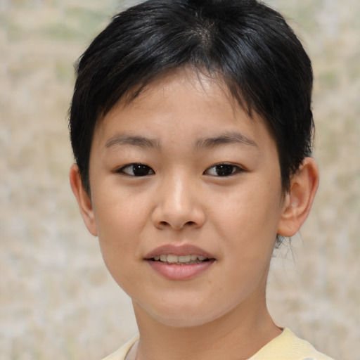 Joyful asian child female with short  brown hair and brown eyes