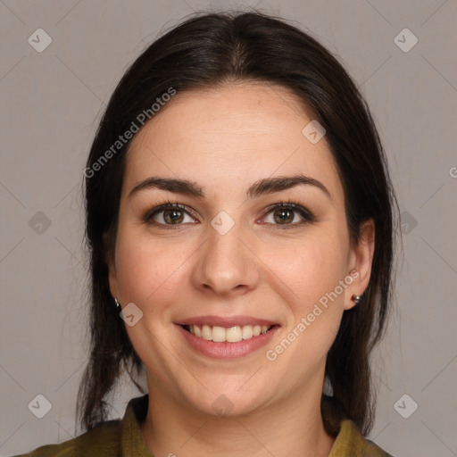 Joyful white young-adult female with medium  brown hair and brown eyes